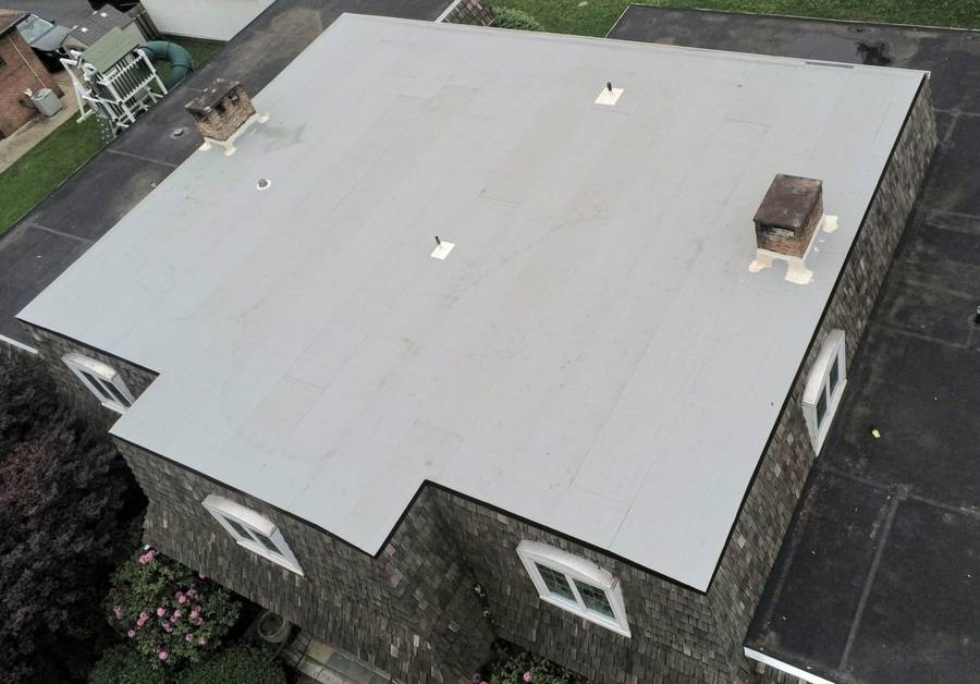 Completed two-ply membrane flat roof